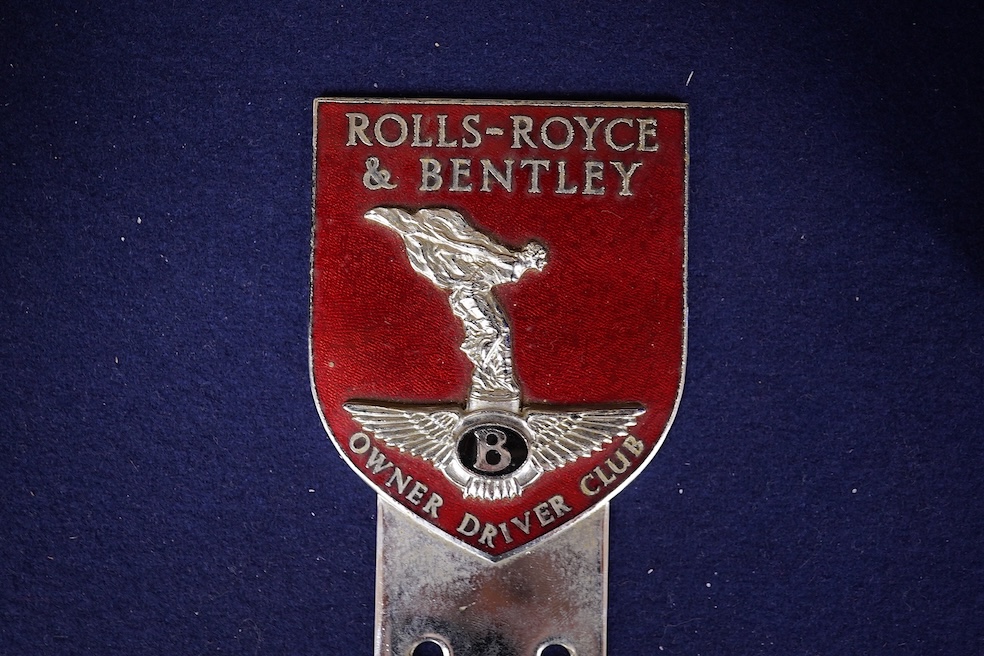 A Rolls Royce and Bentley Owner Driver Club chrome and enamel car radiator badge, 10.7 x 6.6cm. Condition - fair to good.